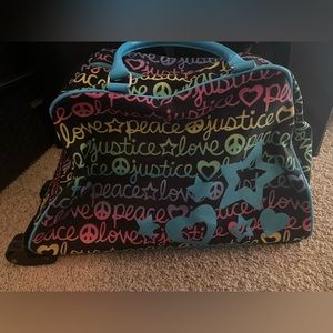 peace & love justice suitcase
